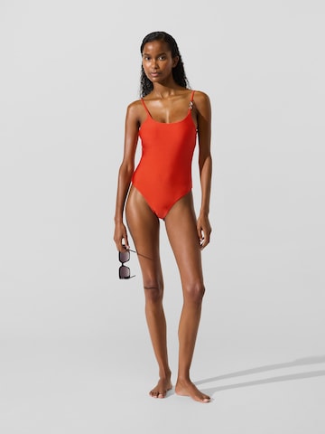 Costume intero di Karl Lagerfeld in arancione