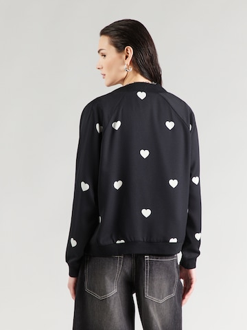 ABOUT YOU Φθινοπωρινό και ανοιξιάτικο μπουφάν 'Erika' σε μαύρο