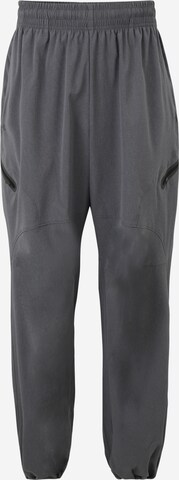 Effilé Pantalon de sport 'Unstoppable' UNDER ARMOUR en gris : devant