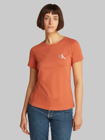 Maglietta di Calvin Klein Jeans in arancione: frontale