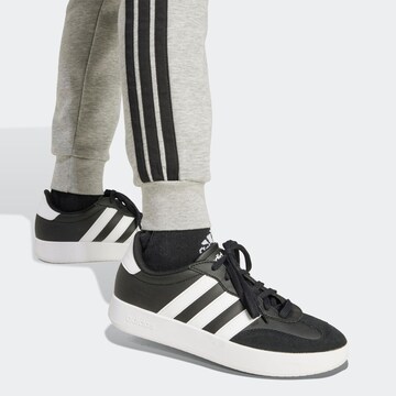 ADIDAS SPORTSWEAR Tapered Workout Pants in Grey