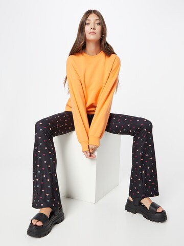 Colourful Rebel Flared Trousers in Black