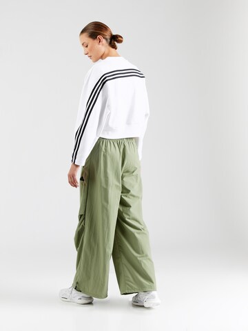 ADIDAS SPORTSWEAR - Pierna ancha Pantalón deportivo 'City Escape' en verde