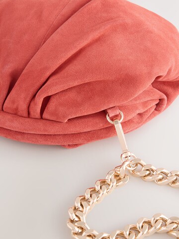 Pochette di Next in arancione