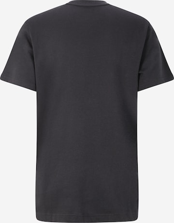 UNDER ARMOUR - Camiseta funcional en negro