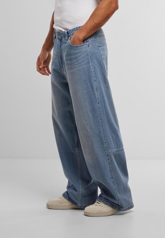 Karl Kani Wide Leg Jeans in Blau