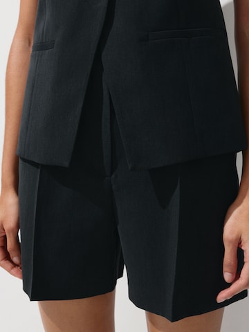 MANGO Regular Trousers with creases 'NAPOLI' in Black