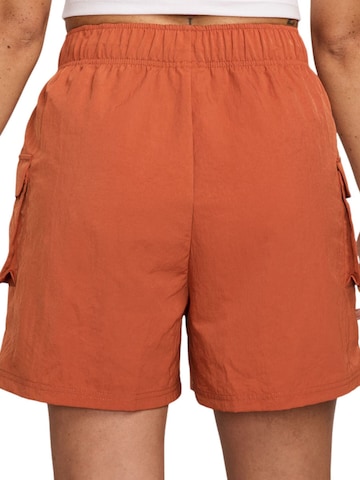 Loosefit Pantaloni cargo 'Essential' di Nike Sportswear in arancione