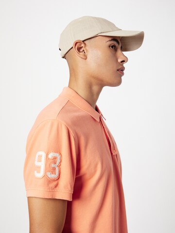 BLEND Poloshirt in Orange