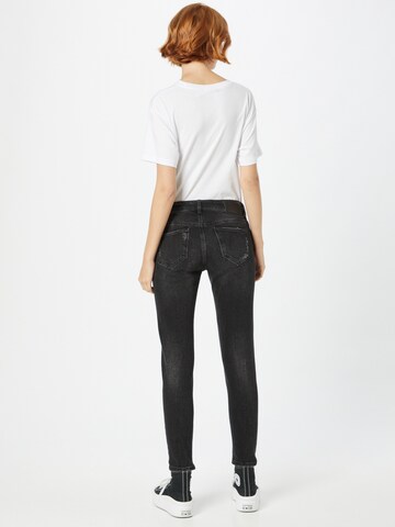 Goldgarn Skinny Jeans in Schwarz