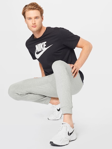 NIKE Tapered Sportsbukser i grå