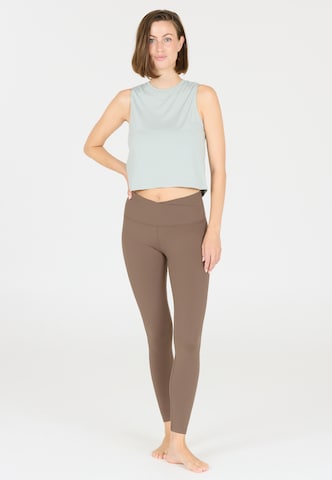 Athlecia Skinny Sportbroek 'Snyder' in Bruin