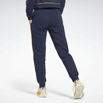 Effilé Pantalon de sport Reebok en bleu