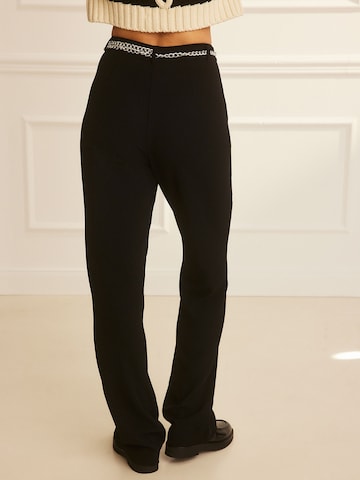 Guido Maria Kretschmer Women Regular Pleat-front trousers 'Floriane' in Black: back