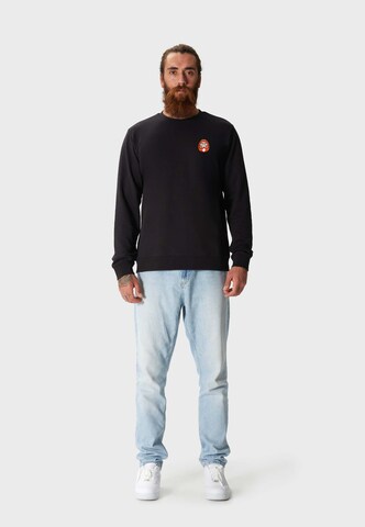 Oldskull Sweatshirt 'ASIAN FURIOUS DARUMA' in Schwarz