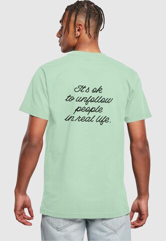 Merchcode Shirt 'Heartbreak' in Groen: voorkant