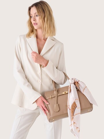 Sacs à main Camomilla Italia en beige : devant
