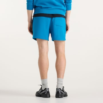 Loosefit Pantaloni 'Athletics French Terry Short 5"' di new balance in blu