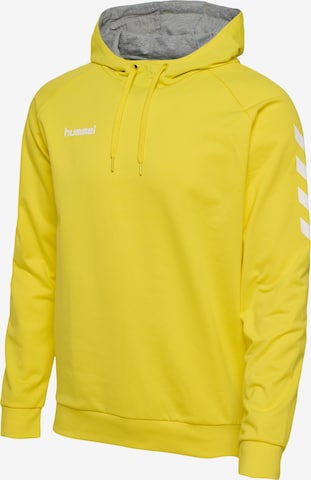 Hummel - Camiseta deportiva en amarillo