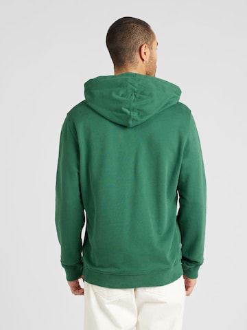 Tommy Jeans - Sweatshirt 'ESNTL' em verde