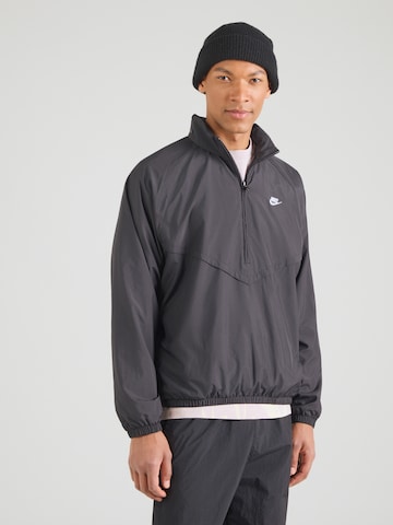 Nike Sportswear Átmeneti dzseki 'WR' - fekete: elől