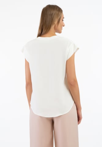 RISA - Blusa en blanco