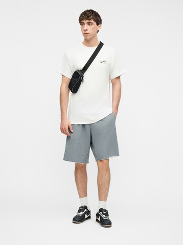 Nike Sportswear T-Shirt 'ATHL' in Weiß