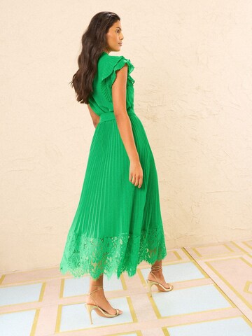 Rochie de la love & roses pe verde