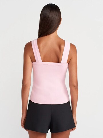 Haut Dilvin en rose