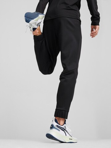 PUMA Tapered Workout Pants 'Train All Day' in Black