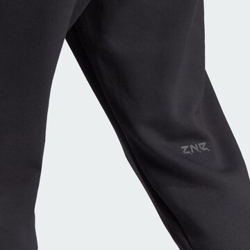 ADIDAS SPORTSWEAR Tapered Sportbroek 'Z.N.E. Premium' in Zwart