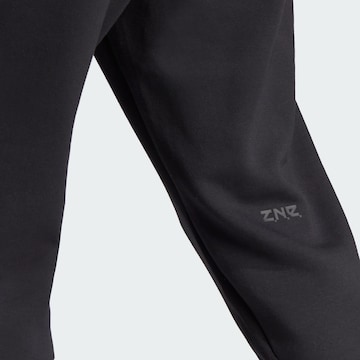 ADIDAS SPORTSWEAR Дънки Tapered Leg Спортен панталон 'Z.N.E. Premium' в черно