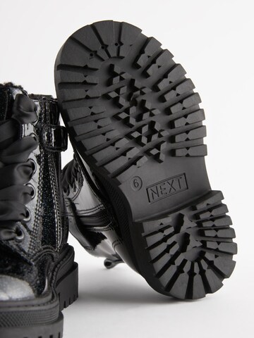 Bottes Next en noir
