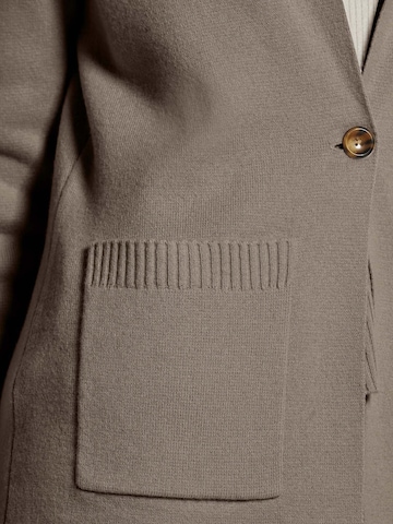 MADELEINE Gebreid vest in Bruin