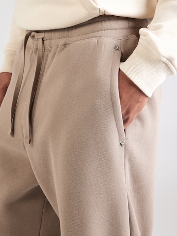 HOLLISTER Lużny krój Spodnie w kolorze brązowy