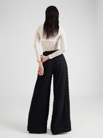 Wide leg Pantaloni con pieghe di Hofmann Copenhagen in nero