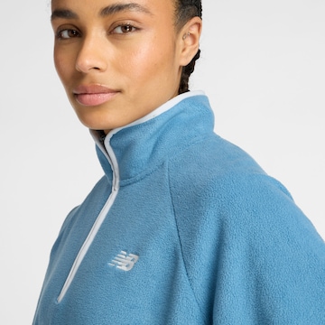 new balance Tussenjas in Blauw