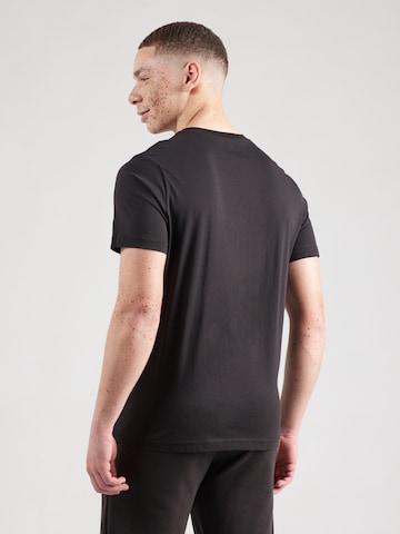 PUMA - Camiseta funcional 'Essential No. 1' en negro