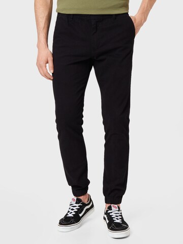 Kronstadt Tapered Chino Pants in Black: front