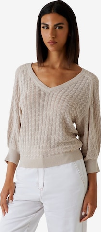 Pull-over GUESS en gris : devant