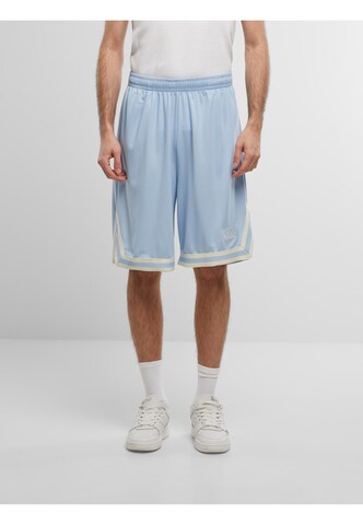 Regular Pantalon ' ' Karl Kani en bleu