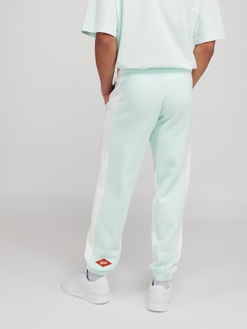 LYCATI exclusive for ABOUT YOU Regular Trousers 'Frosty Earth' in Green: back