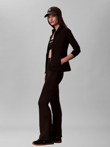 évasé Pantalon Calvin Klein Sport en noir