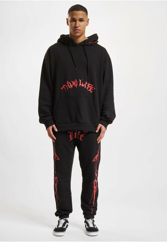 Thug Life Loosefit Sportbroek 'Thug Life Ink' in Zwart