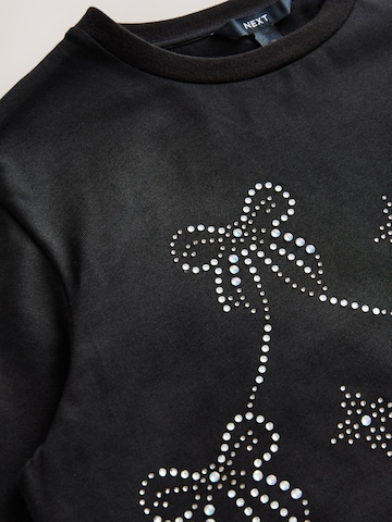 Next - Camiseta en negro