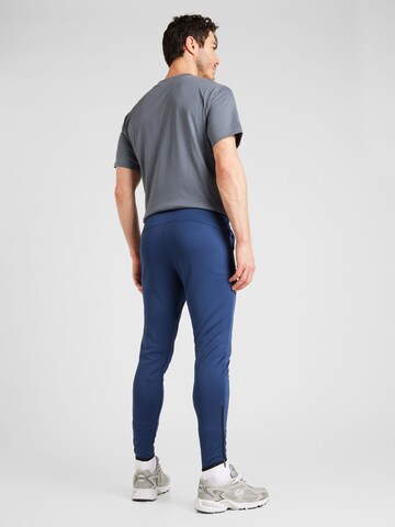 new balance Tapered Sportbroek 'Tenacity' in Blauw