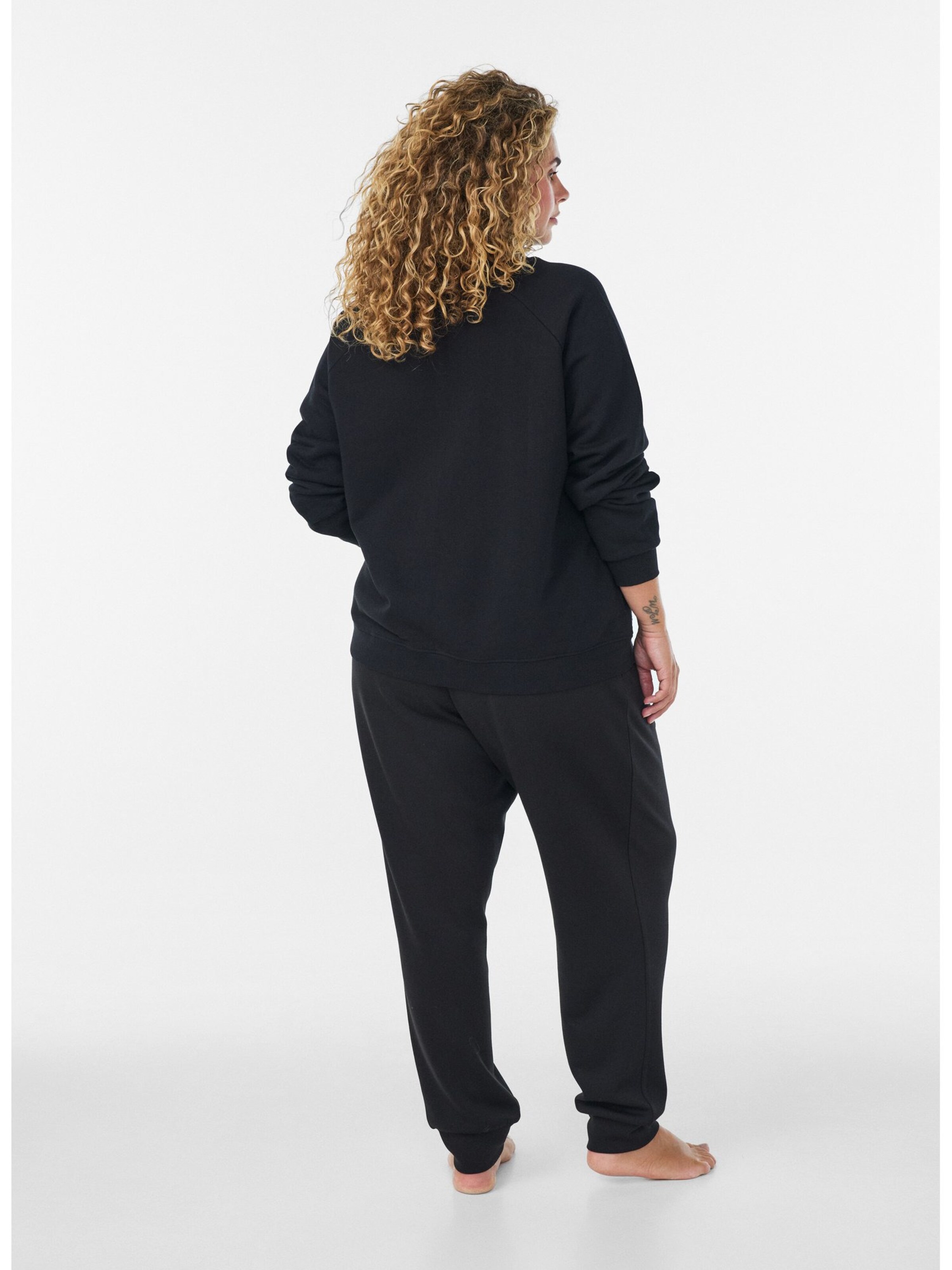 Felpa 'MRIKKE' di Zizzi in nero