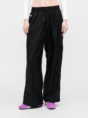PUMA Wide leg Workout Pants 'Puma x Rose' in Black: front