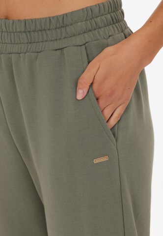 Athlecia Regular Workout Pants 'Aya' in Green