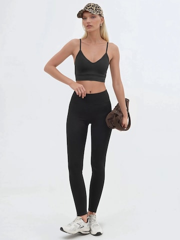 Busem - Skinny Leggings em preto: frente